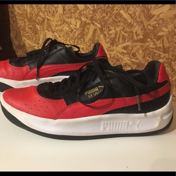 red leather puma sneakers